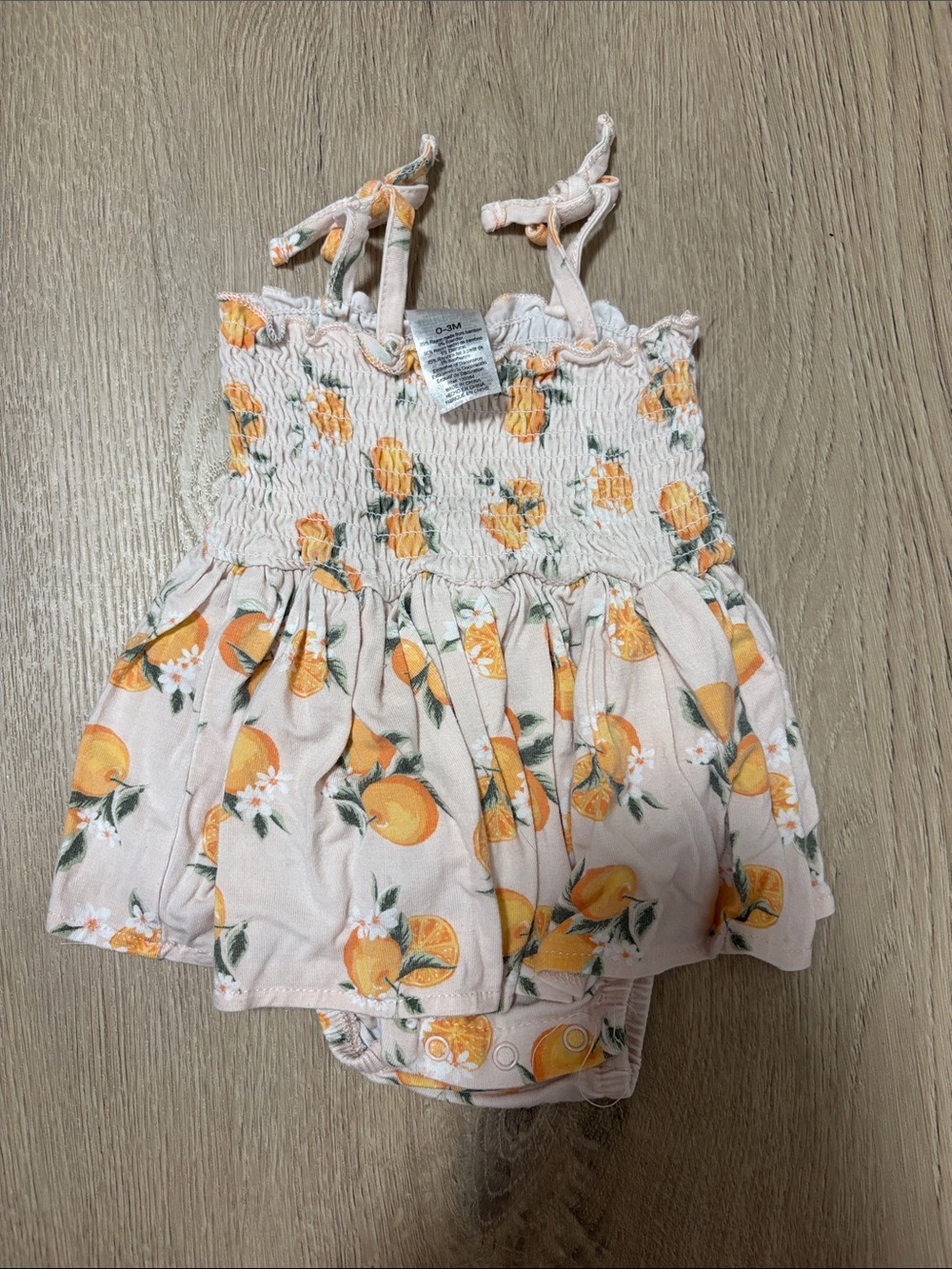 Infant Peach-Print Pink Sundress Romper with Tie Straps